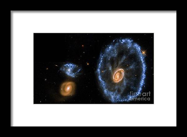 Cartwheel Galaxy Framed Print featuring the photograph Cartwheel Galaxy Group by Nasa/stsci/science Photo Library