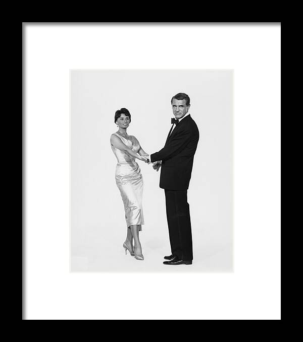 Cary Grant Framed Print featuring the photograph Cary And Sophia by Authenticated News