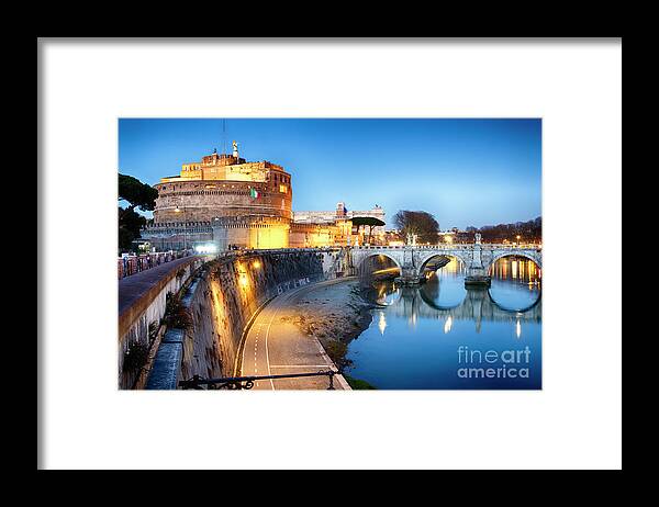 Castel Sant'angelo Framed Print featuring the photograph Castle Of The Holy Angel Lit Up at Dusk by George Oze