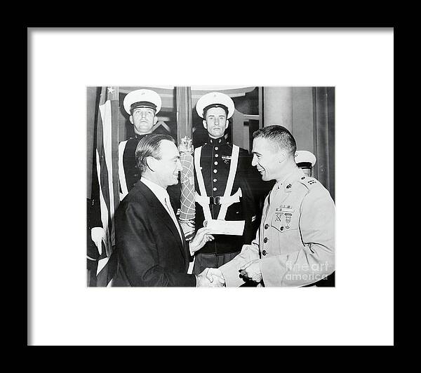 People Framed Print featuring the photograph Charles Revson Shaking Hand by Bettmann