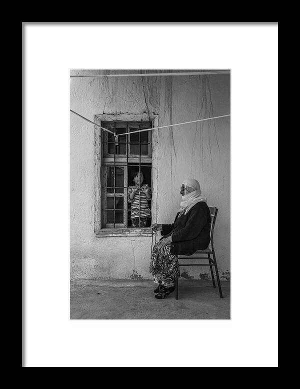 Child Framed Print featuring the photograph Child And Grandmother by Ferhat Gursu