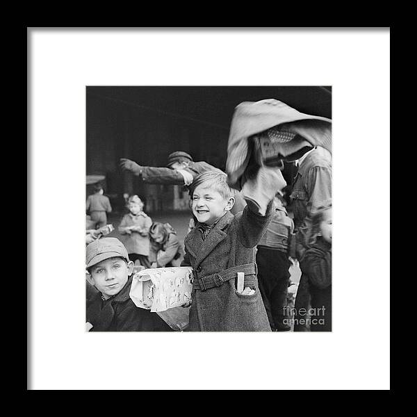 Child Framed Print featuring the photograph Children Opening Christmas In Berlin by Bettmann