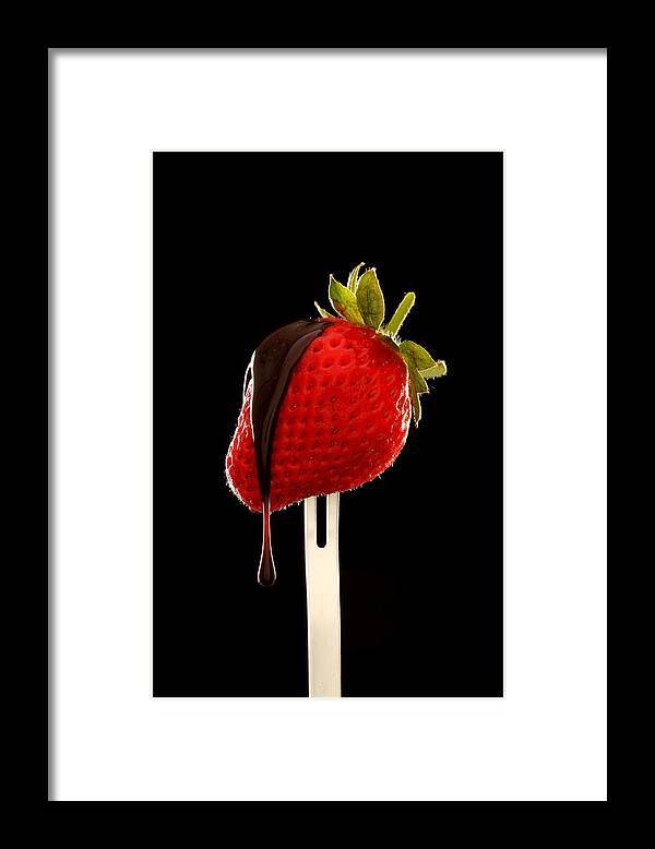 Melting Framed Print featuring the photograph Chocolate Running Off Strawberry by Harrison Eastwood