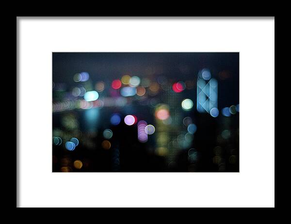 Cityscape Framed Print featuring the photograph City Lights Bokeh by Megan Ahrens