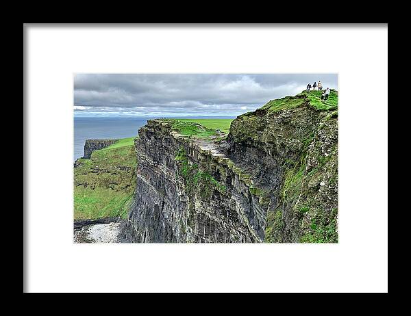 Cliffs Framed Print featuring the photograph Cliff at Cliffs of Moher by Frozen in Time Fine Art Photography