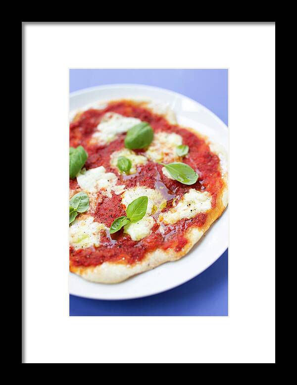 Cheese Framed Print featuring the photograph Close Up Of Pizza With Herbs And Cheese by Brigitte Sporrer