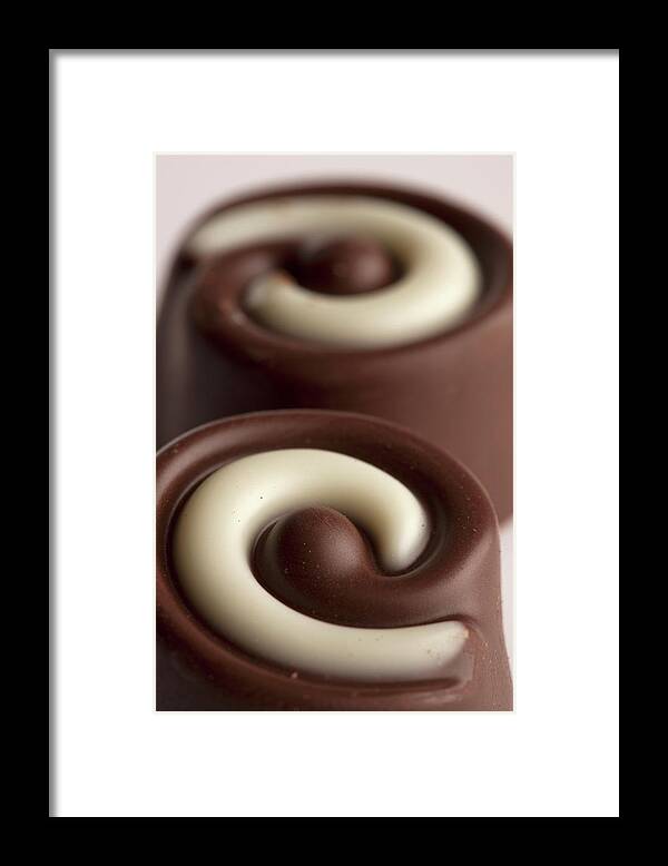 Curve Framed Print featuring the photograph Close-up Of Two Chocolates by Larry Washburn