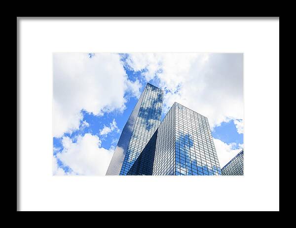 Corporate Business Framed Print featuring the photograph Clouds Reflected In A Modern Glass by Fred Froese