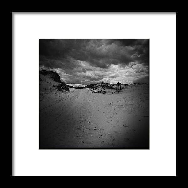 Black And White Framed Print featuring the photograph Cloudy Skies for a Bike Ride by Lisa Burbach