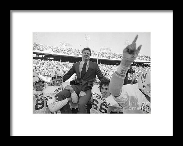 People Framed Print featuring the photograph Coach Tom Osborne Being Carried by Bettmann