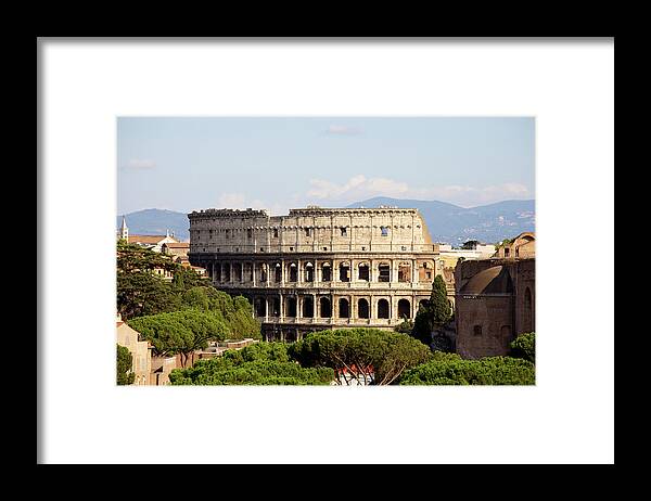 Ancient Framed Print featuring the photograph Coliseum In Rome by Massimo Merlini