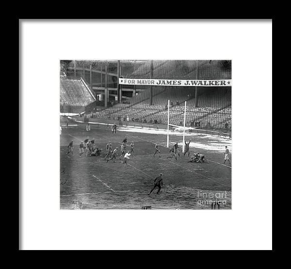 People Framed Print featuring the photograph College Football Game In Progress by Bettmann