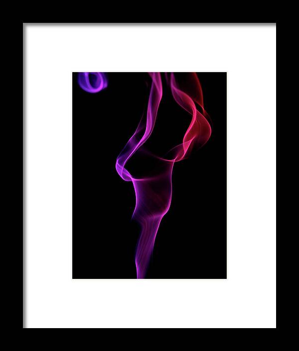 Spooky Framed Print featuring the photograph Coloured Smoke On Black Background by Biwa Studio
