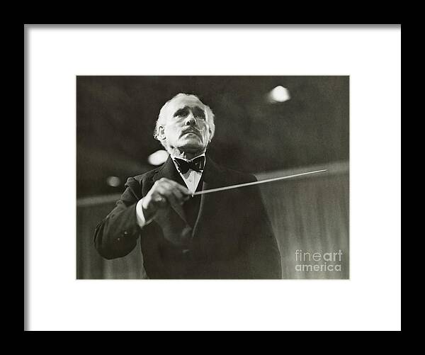 Musical Conductor Framed Print featuring the photograph Conductor Arturo Toscanini Directing by Bettmann