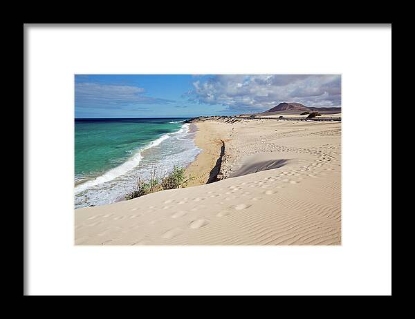 Water's Edge Framed Print featuring the photograph Corralejo by Adrian Hopkins