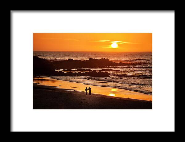 Scenics Framed Print featuring the photograph Couple Watch The Sunset At Carmel Beach by Pgiam