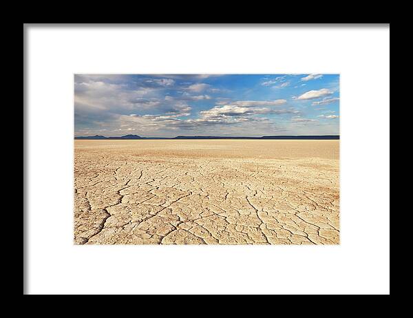 Scenics Framed Print featuring the photograph Cracked Earth In Remote Alvord Desert by Sara winter