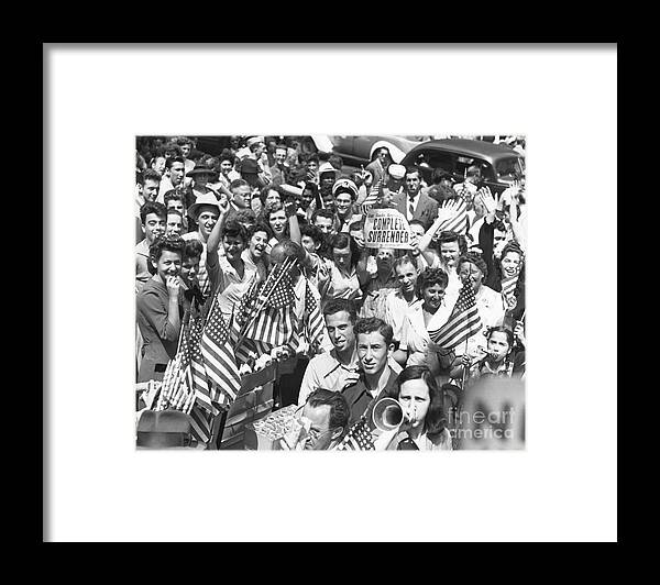 Crowd Of People Framed Print featuring the photograph Crowd Celebrating The World War II End by Bettmann
