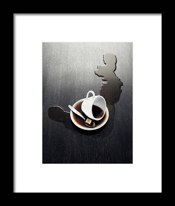 Sweden Framed Print featuring the photograph Cup With Spilled Coffee by Johner Images