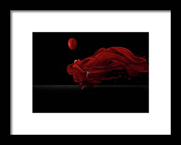 Red Framed Print featuring the photograph Dancing With The Balloon by Sulaiman Almawash