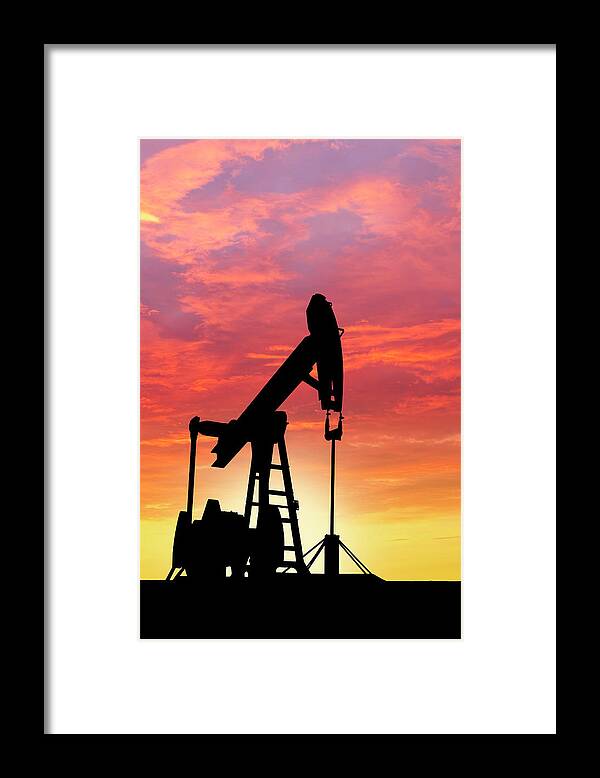 Shadow Framed Print featuring the photograph Dawn Over Petroleum Pumps In The Desert by Grafissimo