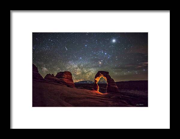 Arches National Park Framed Print featuring the photograph Delicate Arch and the Milky Way by Dan Norris