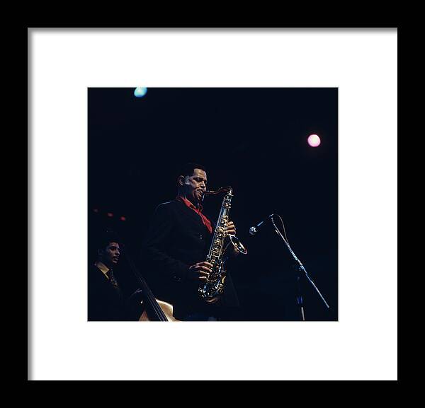 Concert Framed Print featuring the photograph Dexter Gordon Performs On Stage by David Redfern