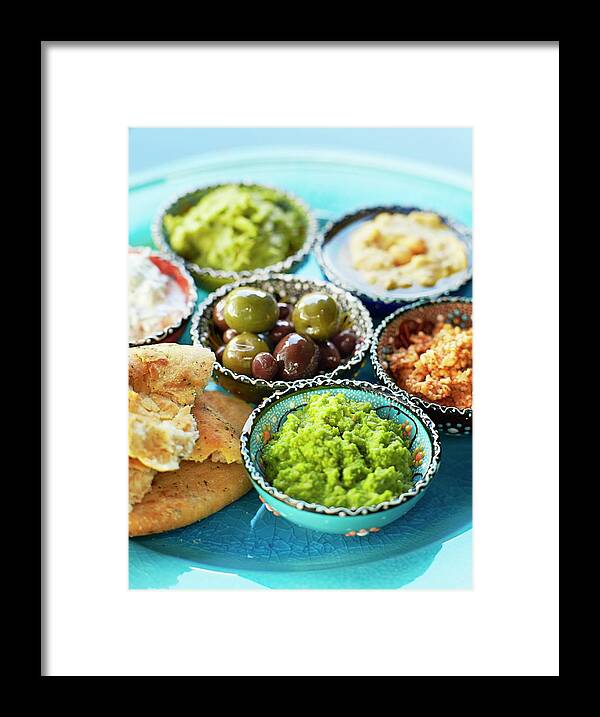 Ip_11274950 Framed Print featuring the photograph Dips: Almond Cream, Hummus, Olive Tapenade, Avocado Cream, Pea Puree, Raita by Lars Ranek