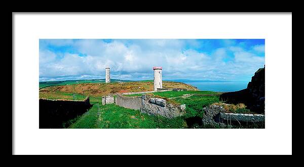 Water's Edge Framed Print featuring the photograph Disused Lighthouse, Wicklow Head, Co by The Irish Image Collection / Design Pics