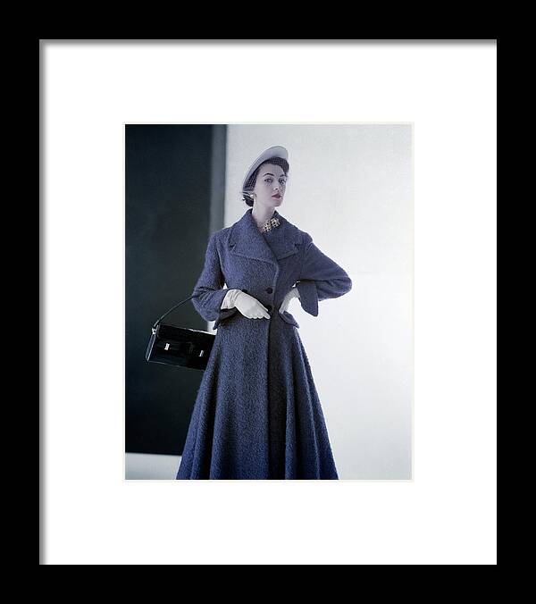 #new2022vogue Framed Print featuring the photograph Dovima In A Blue Seymour Fox Coat by Horst P Horst