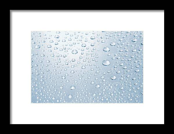 Purity Framed Print featuring the photograph Droplets Of Water On Glass by Pm Images