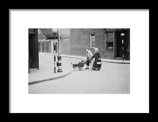 Child Framed Print featuring the photograph East End At War by Bert Hardy
