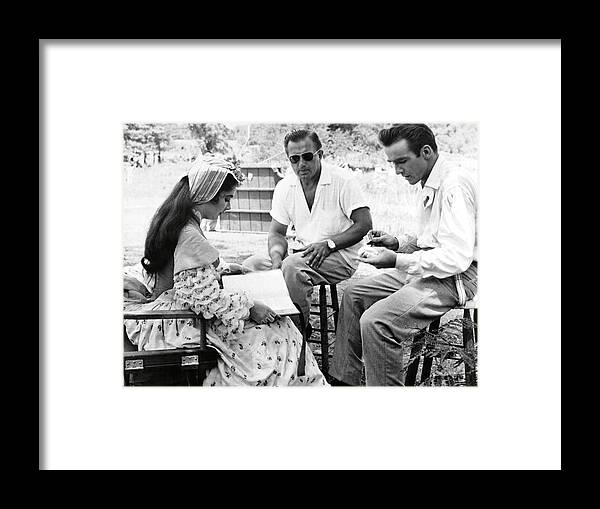 Edward Dmytryk Framed Print featuring the photograph EDWARD DMYTRYK , ELIZABETH TAYLOR and MONTGOMERY CLIFT in RAINTREE COUNTY -1957-. by Album