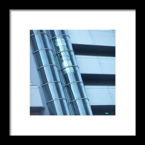 Elevator Framed Print featuring the photograph Elevator Moving In Transparent Tube In by Mixa