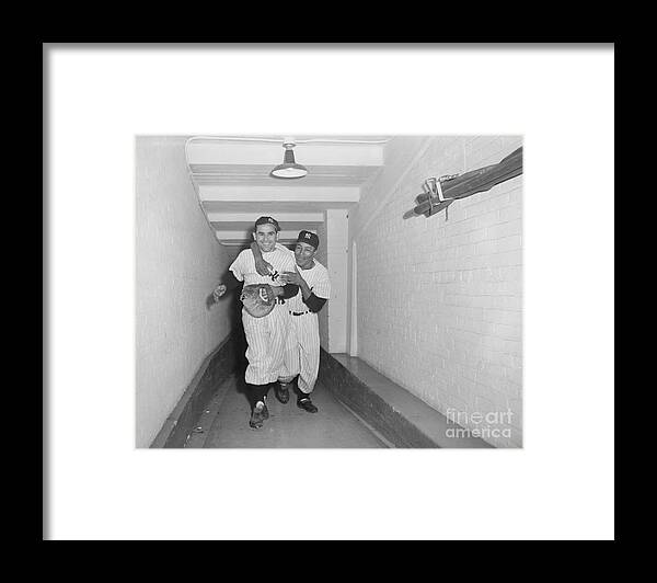 Following Framed Print featuring the photograph Elston Howard Celebrating With Yogi by Bettmann