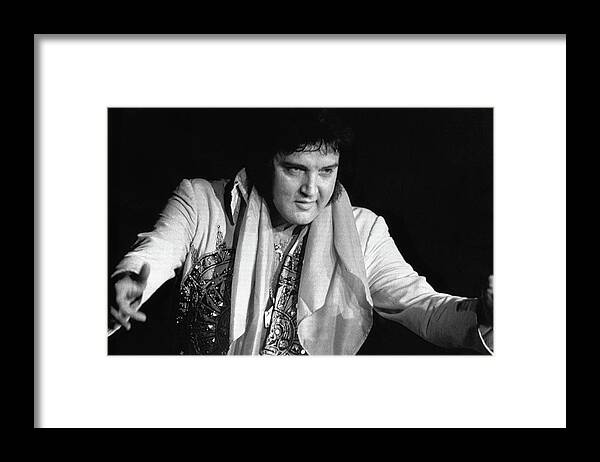 Rock Music Framed Print featuring the photograph Elvis Presley Performing by Bettmann