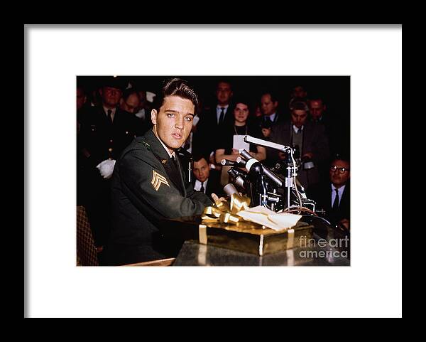 Following Framed Print featuring the photograph Elvis Presley Speaking At Press by Bettmann