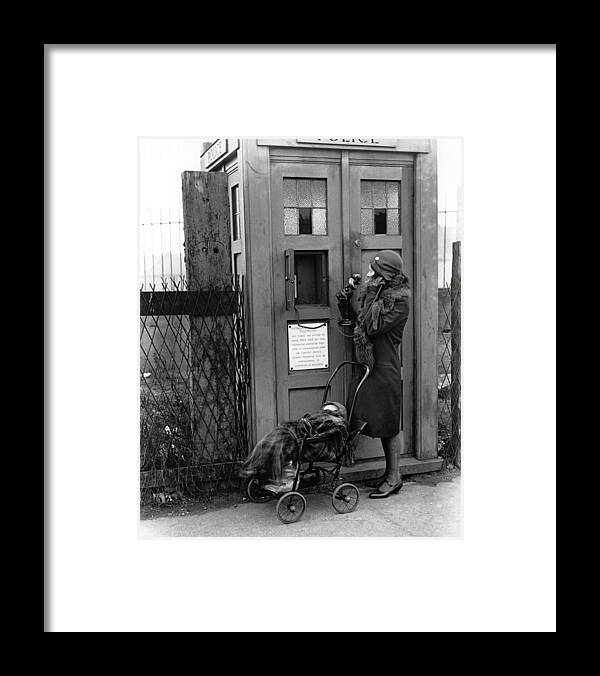 Child Framed Print featuring the photograph Emergency Call Box by Fox Photos