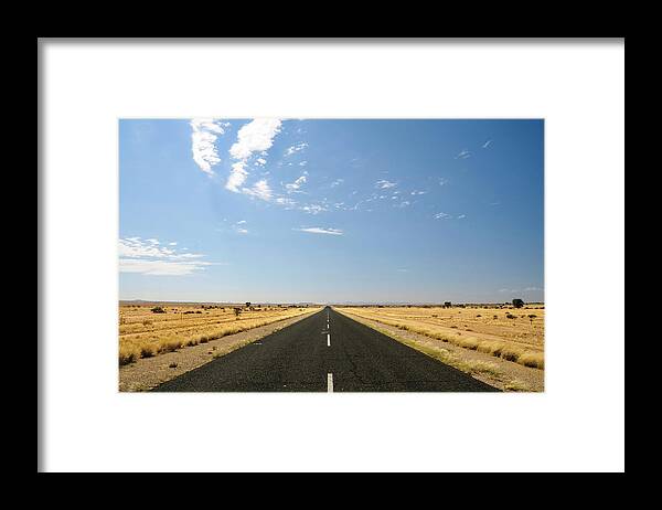 Scenics Framed Print featuring the photograph Empty Road Through Desert, Karas by Andy Nixon