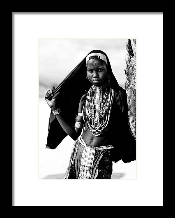 Child Framed Print featuring the photograph Erbore Tribe Woman In Ethiopia On by Eric Lafforgue