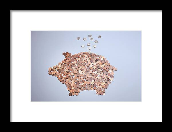 Coin Framed Print featuring the photograph Euro Coins Falling Into A Piggy Bank by Larry Washburn