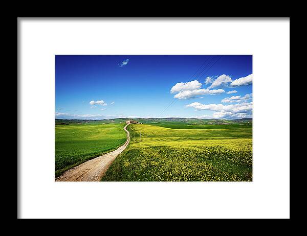 Environmental Conservation Framed Print featuring the photograph Farm, Country Road Through The Fields by Deimagine