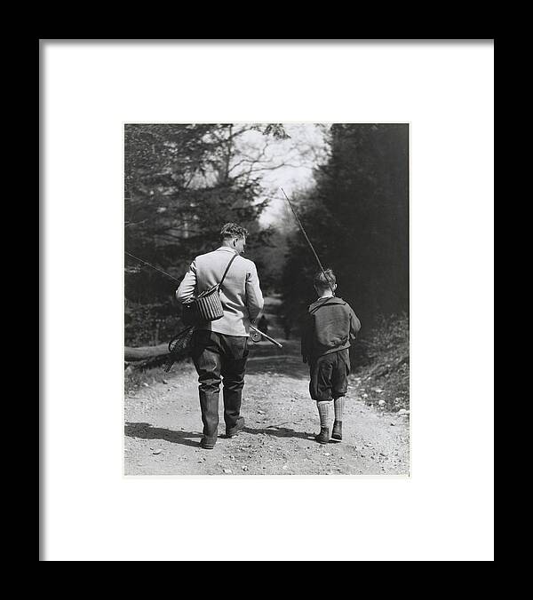 People Framed Print featuring the photograph Father And Son Strolling For Fishing In by Bettmann