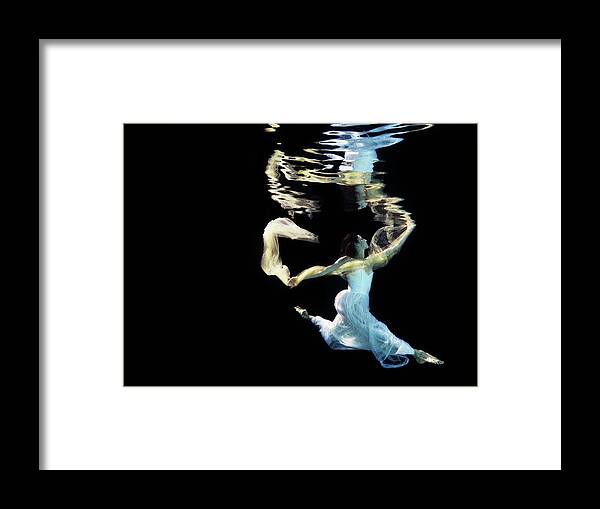 Ballet Dancer Framed Print featuring the photograph Female Dancer Underwater In Wedding by Thomas Barwick