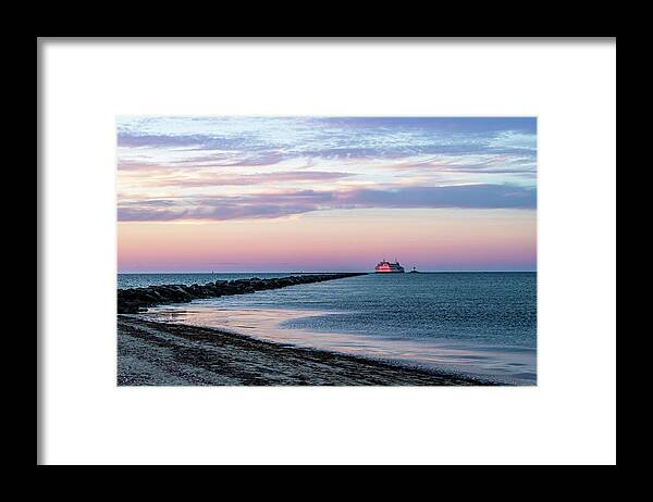 Ferry Framed Print featuring the photograph Ferry Entering The Harbor At Sunset. by Cavan Images