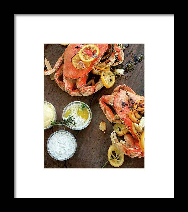 Roast Dinner Framed Print featuring the photograph Fire Roasted Dungeness Crabs On Wooden by Lisa Romerein