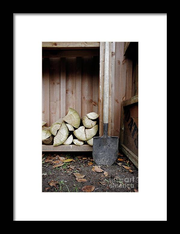 Agriculture Framed Print featuring the photograph Fire wood and spade by Tom Gowanlock