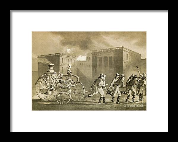 Art Framed Print featuring the photograph Firemen Pulling Steam Fire Engine by Bettmann