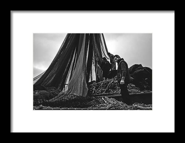 Fisherman Framed Print featuring the photograph Fishermen by Ahmet Mustafa Arvas