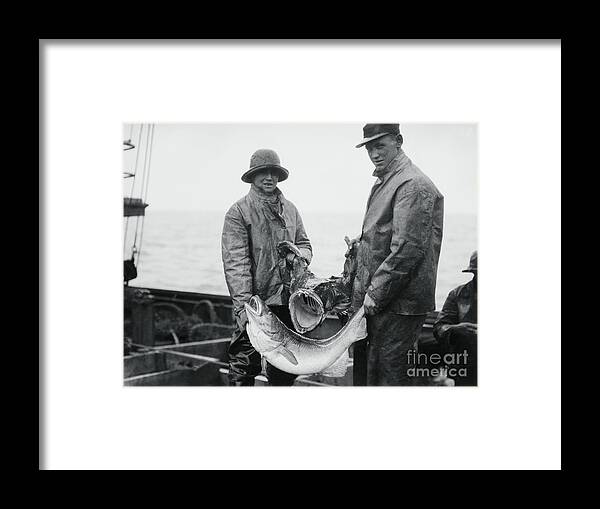 People Framed Print featuring the photograph Fishermen Holding Fish by Bettmann